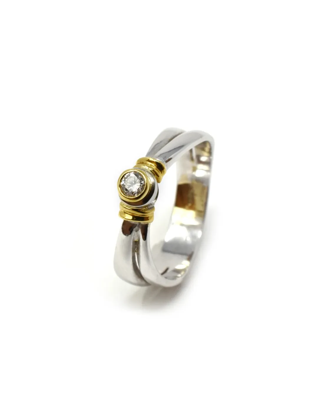 Anello solitario oro bianco e giallo diamante 0,10 ct
