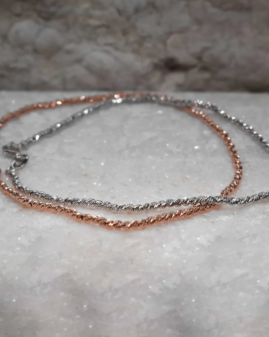 Bracciale palline diamantate in oro rosa