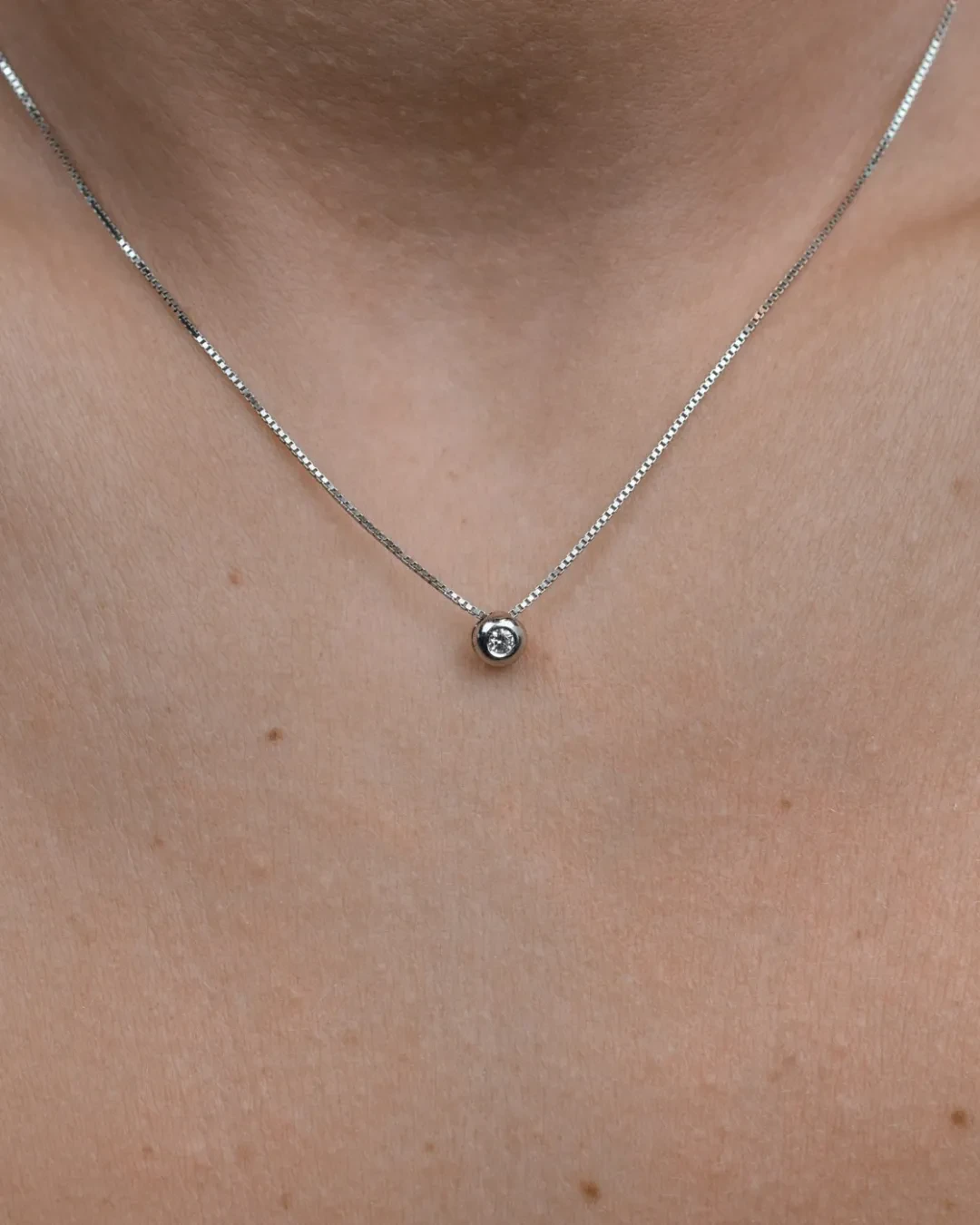 Collana punto luce a cipollina con brillante