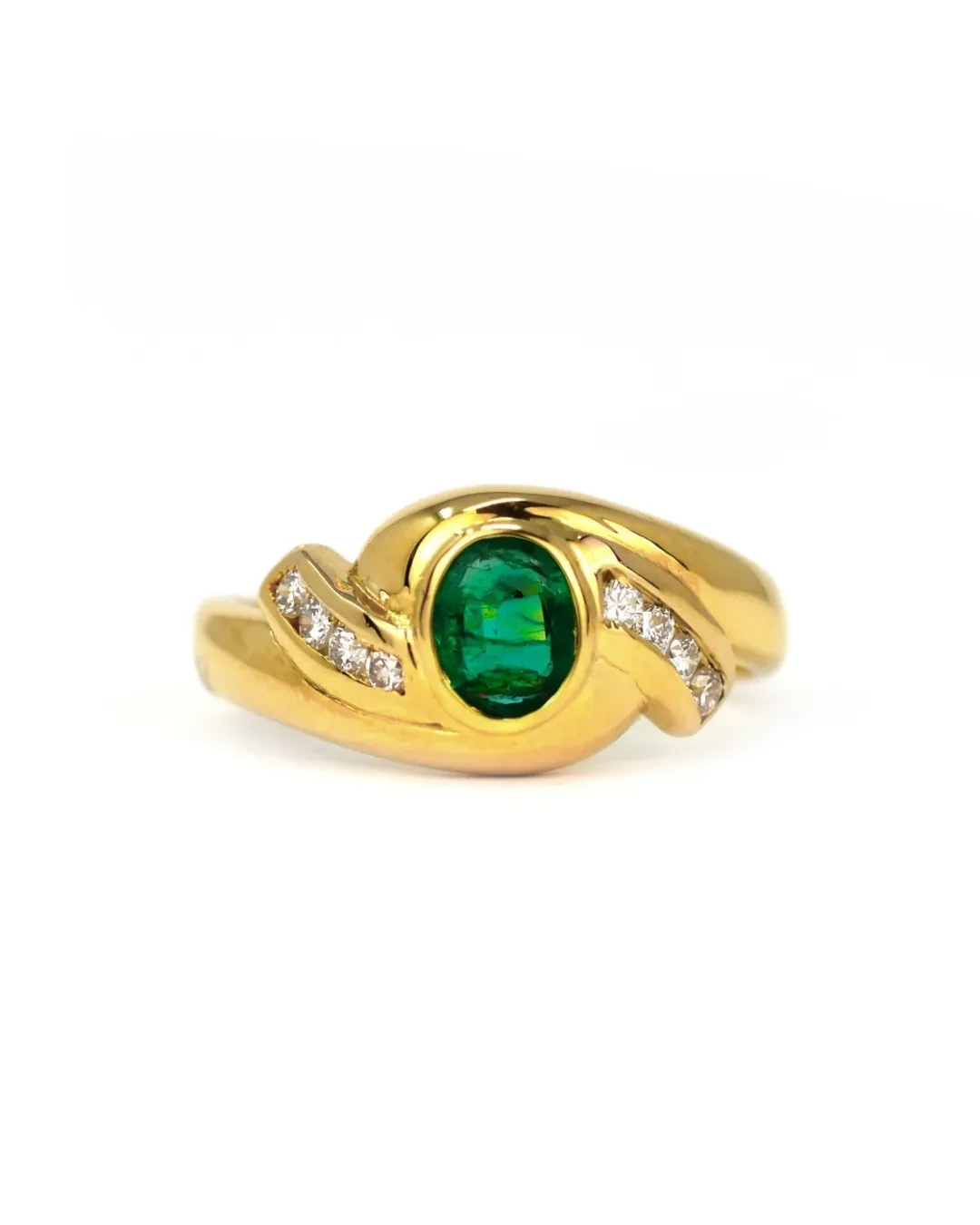 Anello fantasia con smeraldo e brillanti