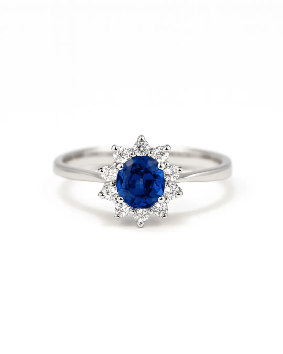Anello in oro bianco, zaffiro ovale e brillanti