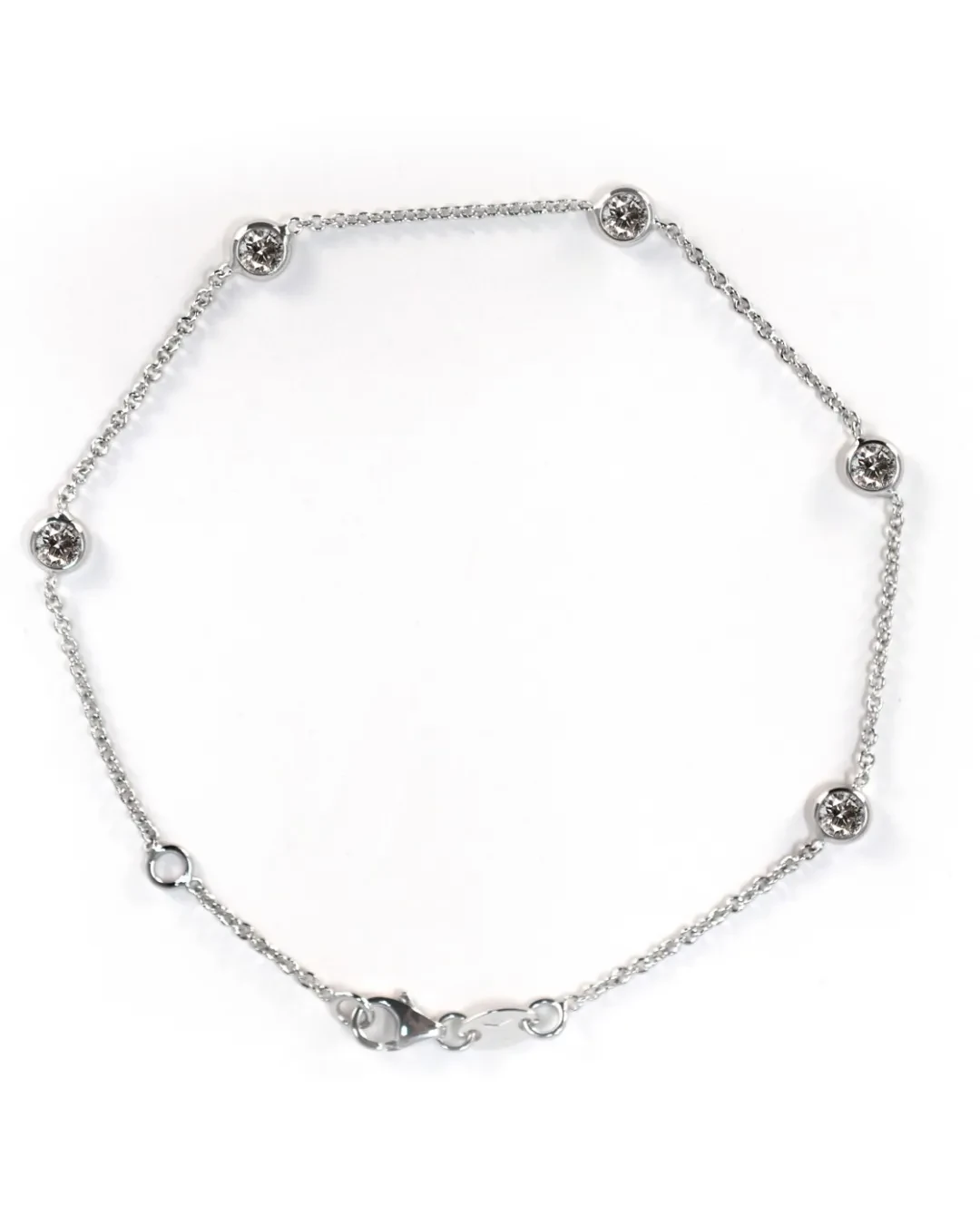 Braccialetto in oro bianco con 5 brillanti da 0,34 ct.