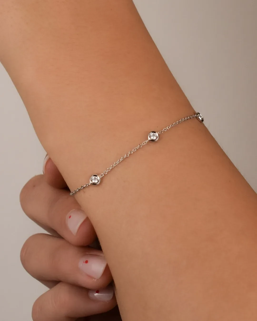 Braccialetto in oro bianco con 5 brillanti da 0,34 ct.