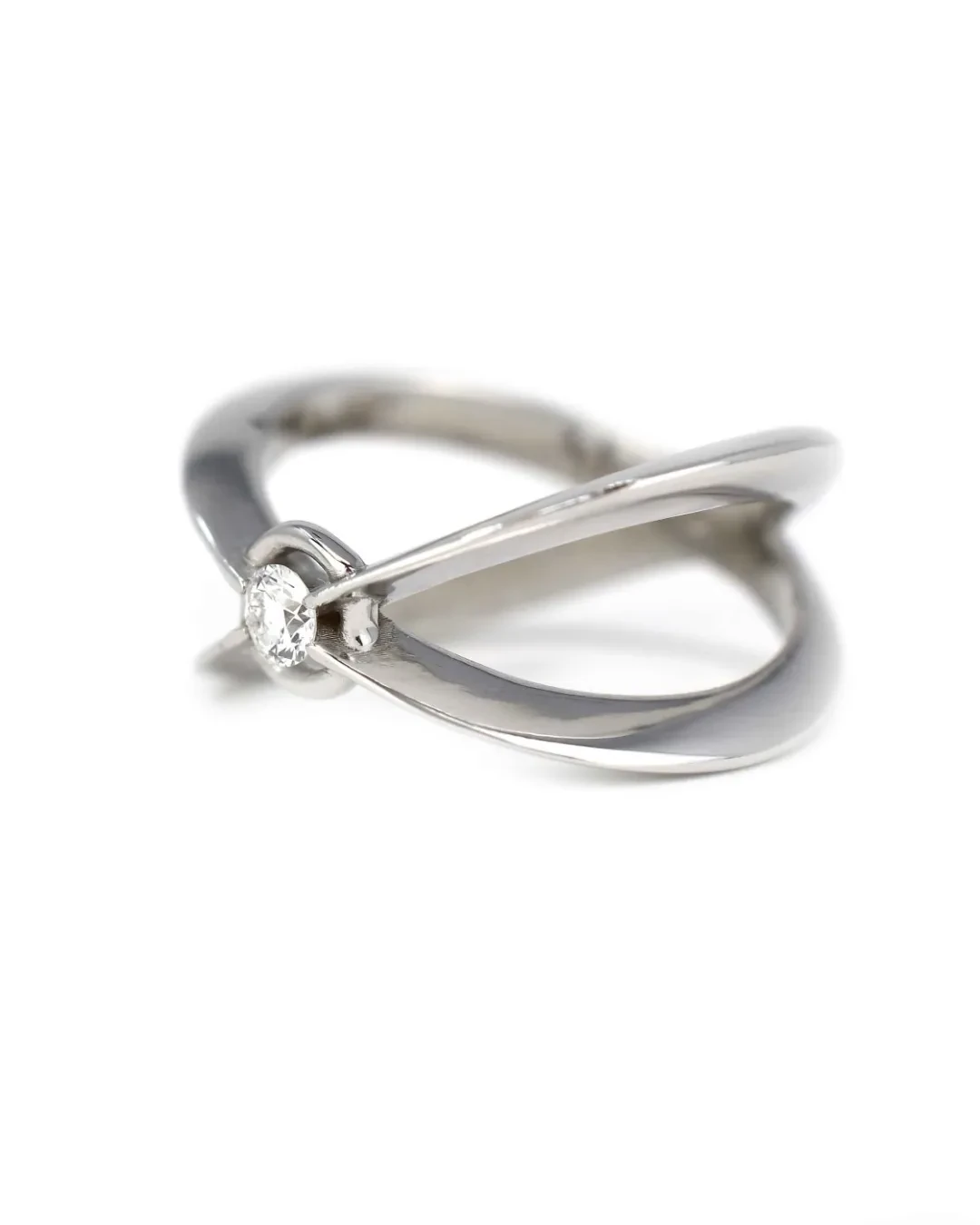 Anello Saturno: solitario fantasia con brillante 0,15 ct