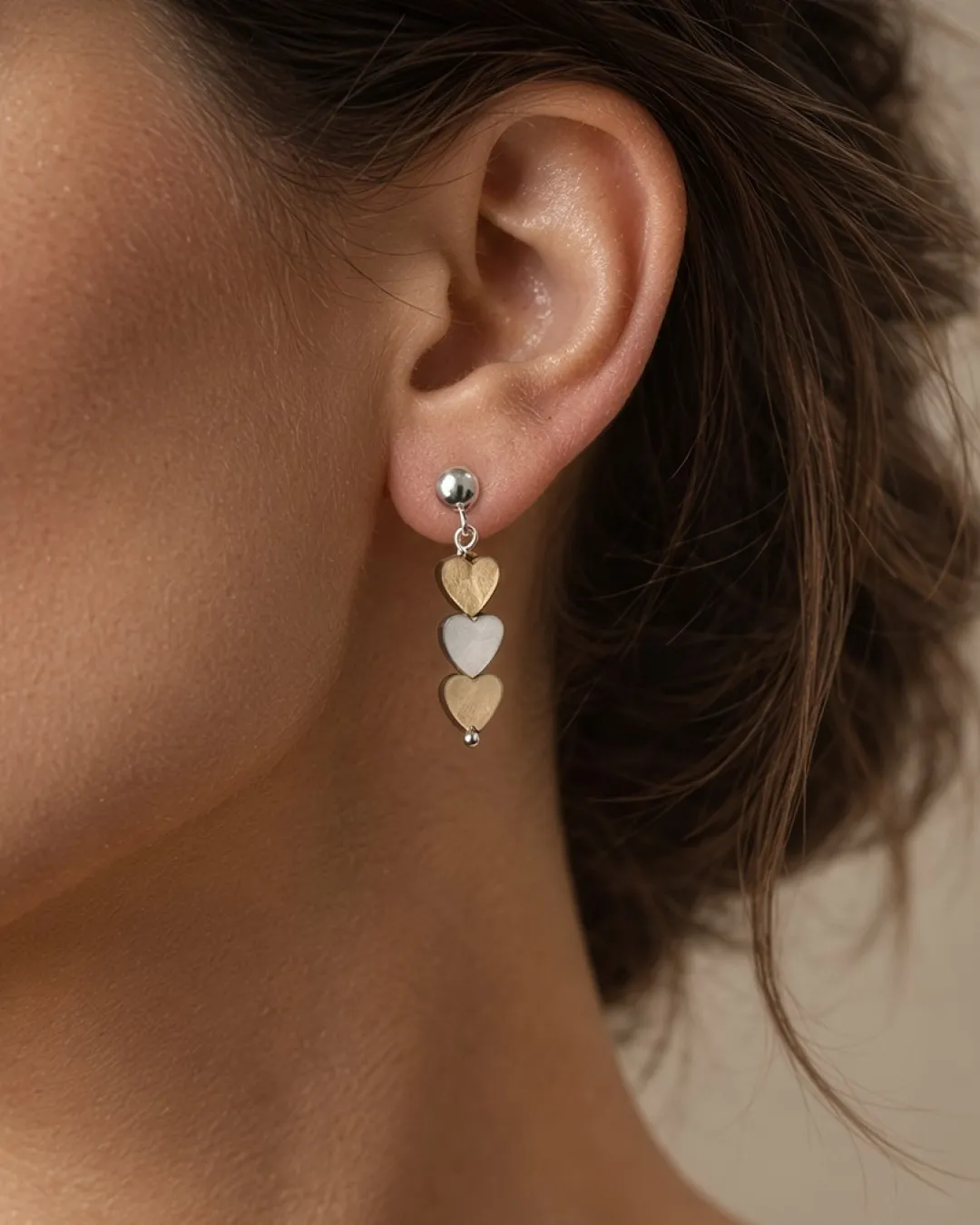Orecchini pendenti con cuori in argento