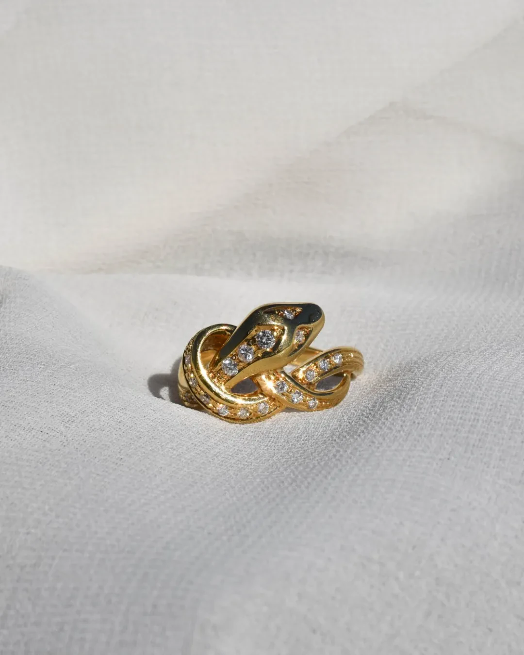 Anello serpente in oro giallo e brillanti