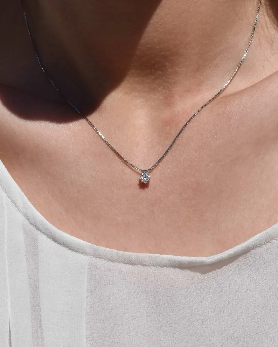 Collana punto luce con diamante a taglio princess