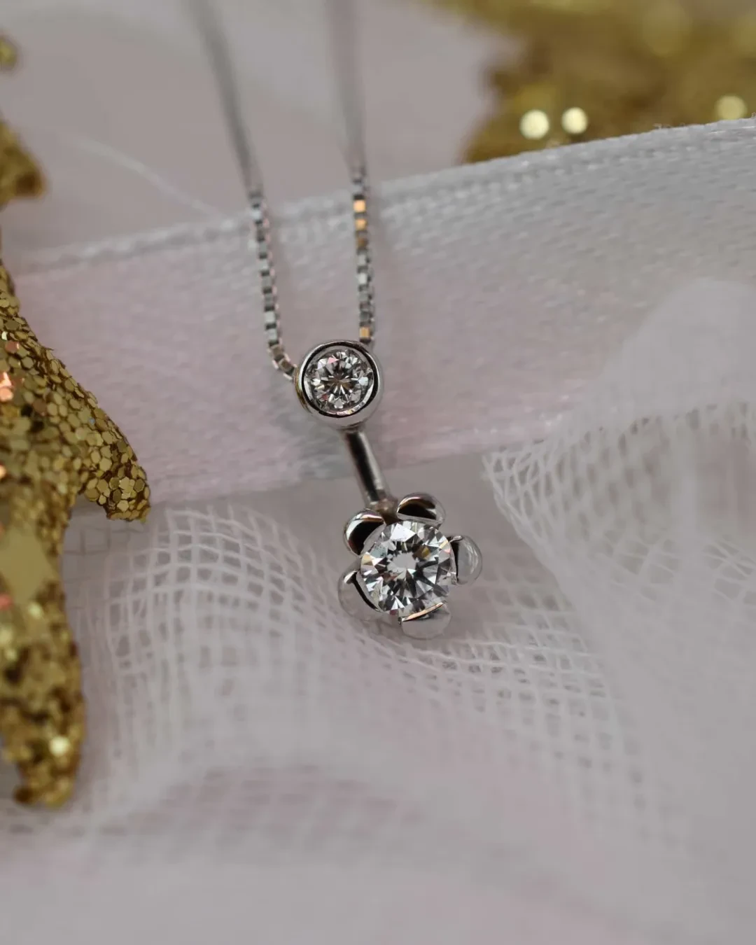 Ciondolo doppio punto luce 0,16 ct