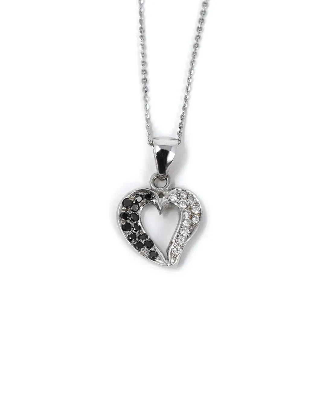 Collana pendente a cuore con brillanti neri bianchi