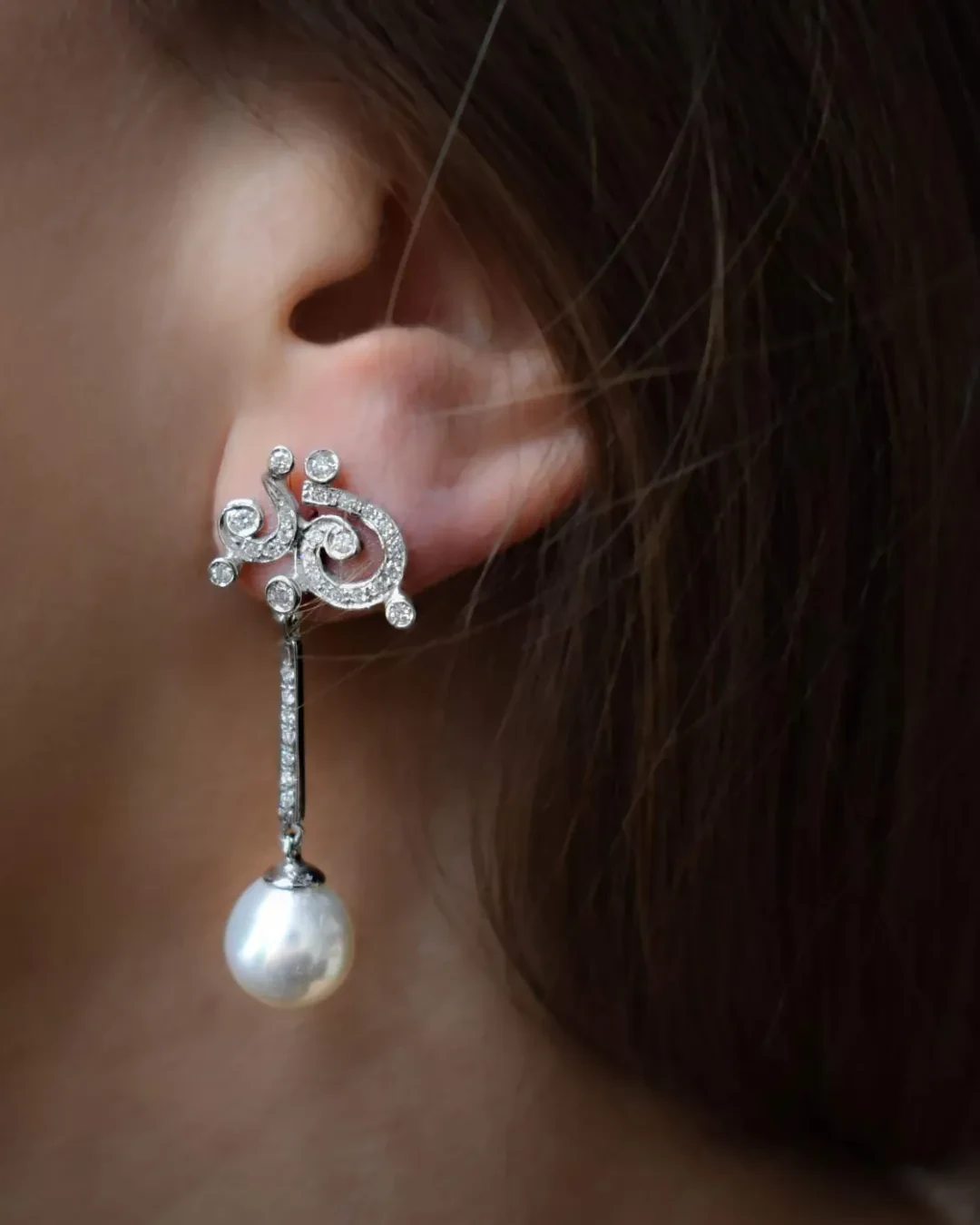 Orecchini fantasia con brillanti e perle