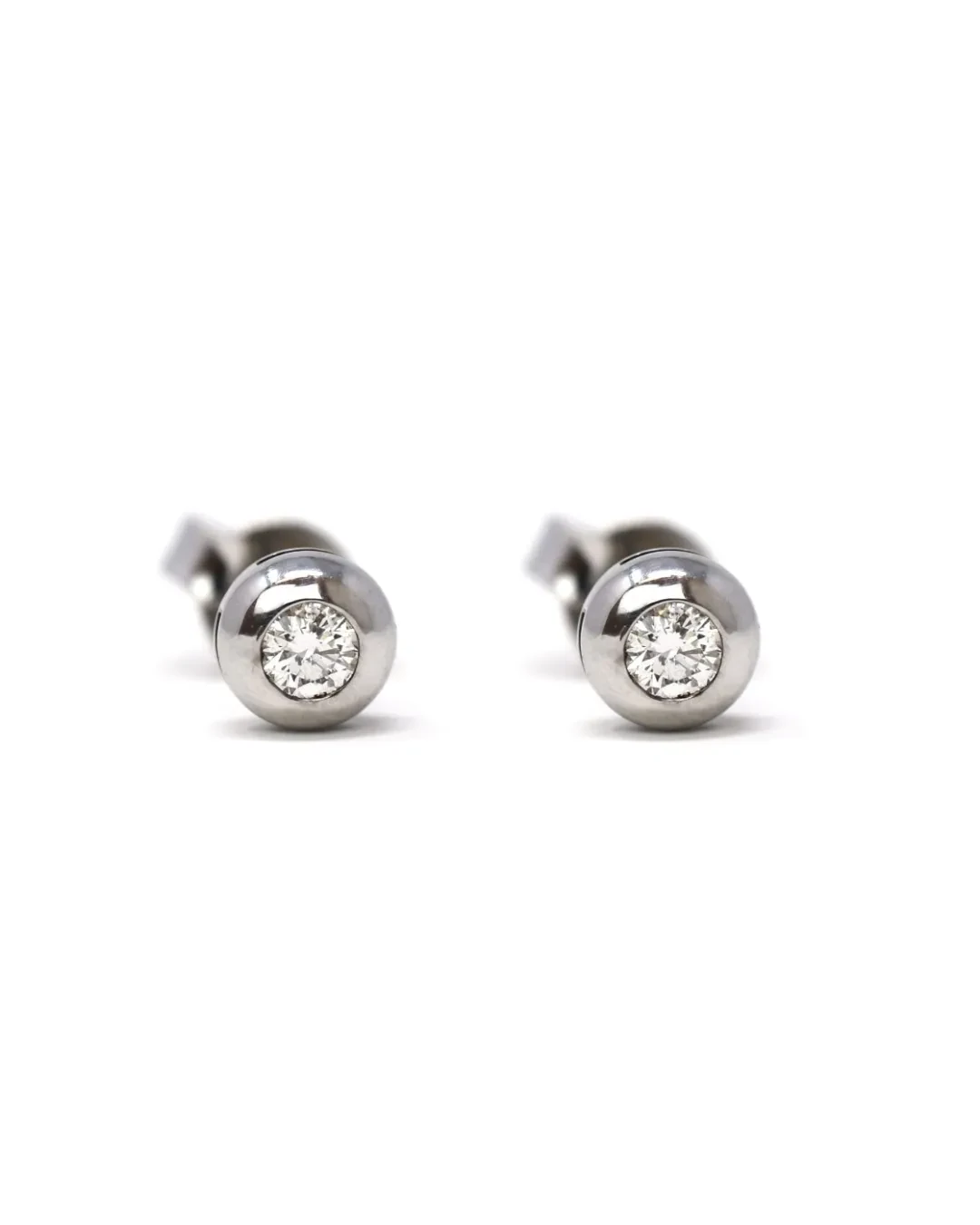 Orecchini punto luce a cipollina con brillanti 0,14 ct