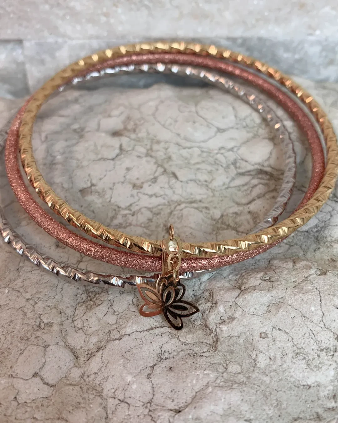 Braccialetti tre cerchi uniti rigidi lavorati