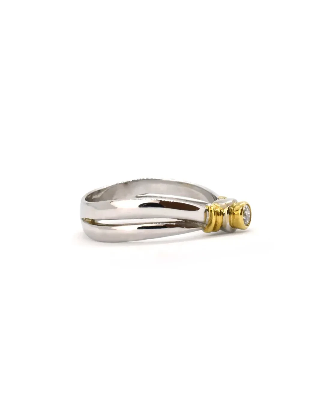 Anello solitario oro bianco e giallo diamante 0,10 ct