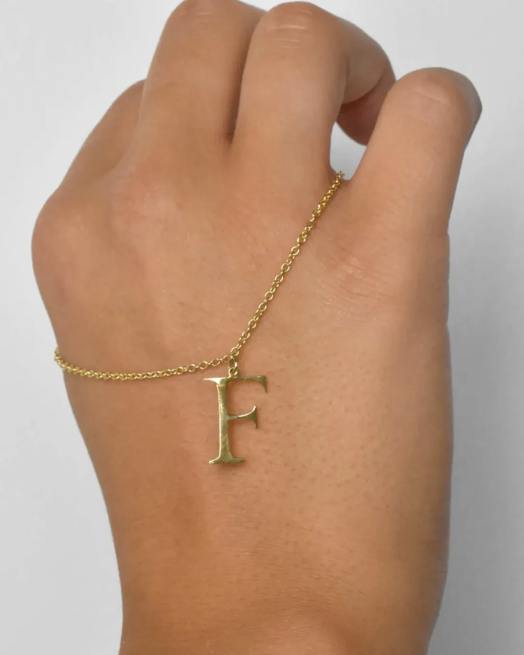 Fermacravatta con iniziale personalizzato